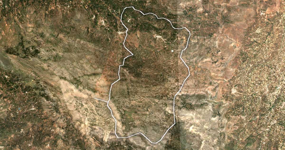Satellitenbild mit eingezeichneter Grenze: Anogia